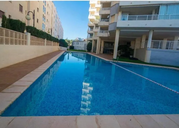 Apartamento Aquarium Park, 1ª linea de playa, piscina privada, aire acondicionado y wifi de alta velocidad